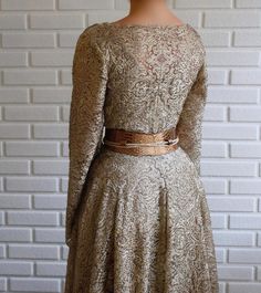 Details- Beige and Gold Color- Sparkling lace fabric- Leather belt detail- V-neck gown with long sleeves- For special occasions Teuta Matoshi, Vintage Gowns, Fashion Plates, Fancy Outfits, Lace Gown, Fantasy Fashion, Elegant Outfit, Fancy Dresses, Stylish Dresses