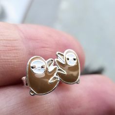 925 Sterling Silver Tiny Sloth Stud Earrings Metal:925 Sterling Silver Hallmark:925 Width:7 mm Height:9 mm >Nickel Free >No Allergic reaction >30 days return policy ++Items come in a gift box ready to be gifted Please contact me if you have any questions about the jewelry you are interested in buying. My Shop: https://www.etsy.com/shop/banujewelryusa Follow BANU Jewelry on Facebook, Instagram and other social media sites to keep up to date with newest products. www.instagram.com/shopban Adjustable Nickel-free White Gold Earrings, Cute Nickel-free Sterling Silver Jewelry, Cute Sterling Silver Nickel-free Jewelry, Cute Sterling Silver Dangle Earrings, Nickel-free Cute Sterling Silver Jewelry, Cute Silver Jewelry Perfect As A Gift, Cute Nickel-free Earrings For Anniversary, Cute Nickel Free Earrings For Anniversary, Cute Sterling Silver Drop Earrings