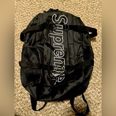 Supreme Fall Winter 2018 Collection Brand New Without Tags Hmu Designer Black Nylon Backpack, Black Bags With Logo Patch For Daily Use, Black Travel Bag With Logo Patch, Casual Black Bags With Logo Patch, Functional Black Bag With Logo Patch, Luxury Black Bags With Logo Patch, Black Backpack With Logo Patch, Black Standard Backpack With Logo Patch, Black Rectangular Bag With Logo Patch