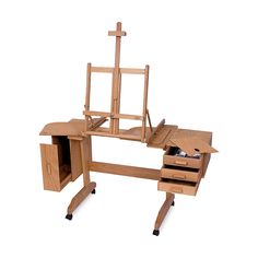 a wooden desk with an easel and drawers