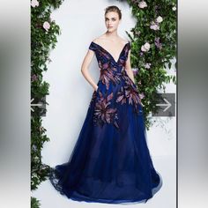 Gorgeous Gown With Beaded Flower Appliqu . It Was Worn Once And The V-Neck Was Tailored To Be Higher. Retails For $2500, Selling For $800. Floral Embroidered V-neck Evening Dress, Formal V-neck Evening Dress With Floral Embroidery, Blue Floral Embellished Gown For Gala, Blue Floral Embellished Evening Gown, Blue Floral Embellished Evening Dress For Gala, Purple V-neck Gown For Gala, Glamorous Formal Evening Dress With Floral Embroidery, V-neck Floral Embroidered Evening Dress For Prom, V-neck Evening Dress With Floral Embroidery For Prom