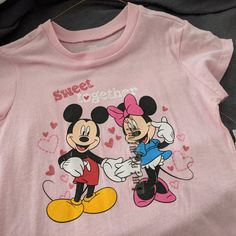 Brand New With Tags. Never Worn. Disney Short Sleeve , Very Cute Girls' Pink T Shirt With Mickey And Minnie!! Size 7/8 Playful Cartoon Print T-shirt For Disney Trips, Pink Disney Cotton T-shirt, Disney Minnie Mouse Pink T-shirt, Cute Pink Minnie Mouse T-shirt, Cute Mickey Mouse Cotton T-shirt, Pink Minnie Mouse T-shirt For Disney Fan Events, Fun Pink Minnie Mouse Top, Cotton Character Print Tops, Character Crew Neck Cotton Top