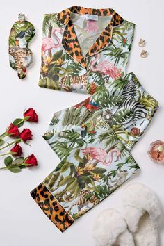 Dream of a tropical paradise with our Suri silk pajamas! Travel with us to the serene, yet vibrant rainforests of Central America with Suri's scenic print, offset with pops of bold leo. This pajamas set is classically elegant, and beautifully detailed 🌴💕🐆 // luxury loungewear, silk pajamas set, loungewear, matching sleepwear set, casual chic, pajamas, camisole set Bold Print Loungewear, Luxury Chic Two-piece Sets, Luxury Silk Sets With Vibrant Print, Luxury Vibrant Festive Sets, Luxury Elegant Party Sleepwear, Luxury Printed Party Sets, Cheap Multicolor Loungewear Intimates, Luxury Casual Printed Sets, Chic Luxury Two-piece Sets