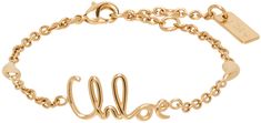 Cable chain bracelet in gold-tone brass. · Logo and graphic charms at length · Logo plaque at adjustable lobster-clasp fastening · L7.5 Supplier color: Vintage gold Gold-tone Chain Bracelet With Logo Charm As Gift, Gold-tone Bracelet With Logo Charm As Gift, Yellow Gold Bracelet With Logo Charm, Gold-tone Metal Bracelets With Logo Charm, Gold-tone Adjustable Chain Charm Bracelet In Brass, Gold-tone Bracelet With Logo Charm, Modern Gift Jewelry With Gold-tone Logo Plaque, Adjustable Gold Bracelets With Gold-tone Logo, Modern Jewelry With Gold-tone Logo Plaque As Gift