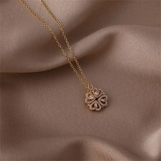 Elevate your ensemble with this delicate necklace that boasts a shining 18k gold-plated finish and sparkling cubic zirconia accents. Chain : 15.75" L with 1.96" extender Pendant : 1.18" W Lobster claw clasp 18k gold-plated copper / cubic zirconia Clover Pendant, Delicate Necklace, Lobster Claw, Cubic Zirconia, 18k Gold, Gold Necklace, Gold Plate, Copper, Sparkle