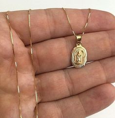 14K SOLID GOLD GUADALUPE NECKLACE .REAL 14K GOLD (NOT PLATED OR FILLED 14K SOLID GOLD BOX CHAIN 20" LONG. 14K SOLID GOLD GUADALUPE PENDANT .—  AVERAGE WEIGHT: 1.74 GR  FOR GOOD LUCK,PROTECTION,HEALTH AND ANY KIND DIFFICULTY. PENDANT SIZE : 20mm X 10 mm  ---BEST QUALITY--- FREE GIFT BOX Guadalupe Necklace, Virgin Mary Pendant, Virgin Of Guadalupe, Good Luck Bracelet, Catholic Jewelry, Jewelry Accessories Ideas, For Good Luck, Gold Box, Earrings Inspiration