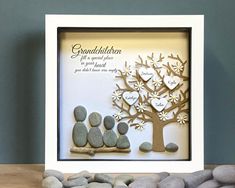 an image of a family tree made out of rocks and paper with the words grandchilden written on it