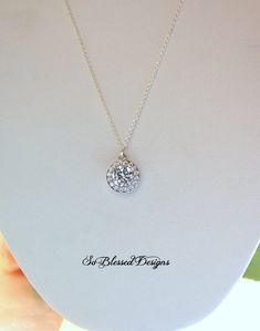 Mother of the Bride Necklace, Mother of the Groom Gift, Diamond CZ solitaire necklace, To Mom from Bride, To Mom from Son, Weddings A beautiful round solitaire diamond CZ necklace. Perfect gift for any Mother of the Bride or Mother of the Groom. The CZ solitaire measures about 10 mm and is very sparkly. Comes on a 16, 18 or 20 inch necklace chain. Necklace comes displayed on a jewelry message card with the poem shown. If you would like a different poem/saying, just leave me a message in the 'not Cubic Zirconia Solitaire Necklace For Wedding, Wedding Round Solitaire Cubic Zirconia Necklace, Round Cut Cubic Zirconia Solitaire Necklace For Wedding, Silver Solitaire Necklace With Halo For Wedding, Wedding Sterling Silver Solitaire Necklace With Round Cut, Wedding Necklaces With Halo Detail, Wedding Solitaire Necklace With Round Halo Pendant, Wedding Solitaire Necklace With Halo Setting, Wedding Round Pendant Solitaire Necklace With Halo Setting