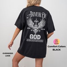 Show your faith with our Armor of God Christian T-Shirt, featuring an inspiring Bible verse and angel wings design. This trendy and comfortable Jesus shirt is perfect for any occasion and makes a thoughtful gift. Handmade in the United States, this shirt is an ideal choice for any season, be it winter, summer, fall, or spring. Size up 2 sizes for an oversized look and feel. How To Order 1) Please review all of the photos. 2) Choose your shirt size and color. 3) Click Add to Cart.  4) Click the a Jesus Clothing, Jesus Clothes, Angel Wings Design, Boho Christian, Faith Clothing, God Christian, Jesus Shirt, Clothing Gifts, Christian T Shirt