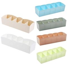 four different colored plastic containers with dividers