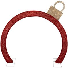 a red and gold glittered object with a lock on it's back end