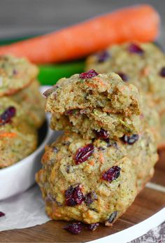 carrots and cranberries are stacked on top of each other