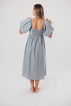 The Hamilton is everything you're looking for in a midi dress - charming, sophisticated, and absolutely flattering. It features premium quality details, like a sweetheart neckline and gorgeous balloon sleeves that can be worn on or off the shoulder. It's an unforgettable choice for every body type, and extra-comfy for expecting mamas! The best part? You can wear this beauty long after your sweet baby arrives! Available in multiple colorways. FIT: Runs true to size. Features a smocked back panel for comfort. This dress is roomy in the waist and will accommodate early maternity in your true size, but consider sizing up if you are in advanced pregnancy. MATERIAL: GARMENT DETAILS: Empire-waisted midi dress, with sweetheart neckline and statement balloon sleeves that can be worn on or off the s Feminine Puff Sleeve Dress With Sweetheart Neckline For Brunch, Spring Midi Dress With Balloon Sleeves For Brunch, Spring Midi Dress With Balloon Sleeves And Ruched Detail, Chic Midi Dress With Gathered Sleeves And Sweetheart Neckline, Chic Midi Dress With Sweetheart Neckline And Gathered Sleeves, Brunch Puff Sleeve Dress With Sweetheart Neckline, Puff Sleeve Dress With Sweetheart Neckline For Brunch, Elegant Midi Dress With Smocked Bodice, Spring Day Out Puff Sleeve Dress With Sweetheart Neckline