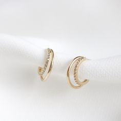 The Pari earrings feature paved crystals on the inner hoop, layered with a smooth hoop. Size: 15mm, paired with a smaller 12mm huggie (Approx.) Main material:   - 16k Gold/ Rose Gold/ Rhodium Plated, Brass,  - 92.5 Sterling Silver Post -  Cubic Zirconia --------------------------------------------------- Instagram Follow us @statementgrey Bridesmaids Earrings , Wedding Earrings, Pretty Earrings, Bridal Earrings, Bridal Jewelry, Bridesmaids Gifts Small Hoop Jewelry With Diamond Accents For Wedding, Small Hoop Earrings For Wedding, Gold Hoop Earrings With Diamond Accents For Wedding, Small Hoop Pierced Earrings For Wedding, Pierced Hoop Earrings For Wedding, Small Hoop Wedding Jewelry With Diamond Accents, Wedding Huggie Drop Earrings, Small Hoop Diamond Earrings With Accents For Wedding, Elegant Hoop Wrap Earrings For Anniversary