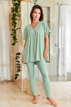 From sunrise to sunset, the Mint Jersey Top & Leggings Pajama Set is your everyday essential. Perfect for lazy mornings or movie nights in, these pajamas are as comfy as they are cute. Product code: CAA10A4D017PP Features:  V-neckline Short sleeves Material: 65%POLYESTER,35%COTTON. Green Stretch Sleepwear For Loungewear, Green Stretch Sleepwear For Lounging, Comfy Stretch Sleepwear For Loungewear, Comfortable Stretch Sleepwear For Relaxation, Comfy Stretch Sleepwear For Spring, Solid Color Relaxed Fit Leggings For Loungewear, Green Athleisure Leggings For Loungewear, Relaxed Fit Solid Color Leggings For Loungewear, Stretch Athleisure Sleepwear For Loungewear