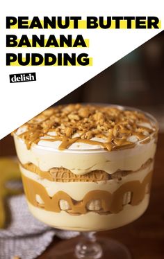 a banana pudding in a glass dish on a table with the title peanut butter banana pudding