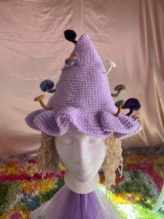 A whimsical 3D mushroom witch hat! The frilly brim allows it to fit most head sizes. The white mushrooms glow in the dark!! Every mushroom stem is crocheted around flexible wire and can be bent and held into different positions. The smaller your head, the more brim will stick out. Flat across outside-edge to outside-edge it measures about 11 inches. Point stands at about 10 inches tall. (Images with a measuring tape, as well as an example on human models with XL and one with XS adult head measurements can be found in the images of this listing!) Perfect for a magical cottagecore outfit or earth witch or fairy costume! Crocheted with love, in a (sadly) pet free household. Witch Hat Mushroom, Big Mushroom Hat, Mushroom Hat With Lace, Mushroom Witch Hat, Mushroom Witch Hat Crochet, Mushroom Stem, Magical Cottagecore, Mushroom Hat For Sale, Mushroom Witch