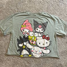 Nwot Sanrio Hello Kitty & Friends Cropped T-Shirt. Short Sleeved. It’s A Light Green Color. Washed But Never Worn. Hello Kitty Fun Crew Neck Top, Hello Kitty Crew Neck Fun Tops, Cute Green Top With Cartoon Print, Kawaii Hello Kitty Print Crew Neck Top, Hello Kitty Short Sleeve Top, Y2k Hello Kitty Print Short Sleeve Tops, Hello Kitty Print Y2k Crew Neck Top, Y2k Hello Kitty Print Crew Neck Top, Fun Hello Kitty Short Sleeve Tops