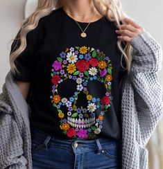 Floral Sugar Skull t shirt - Dia de los muertos tee - Cinco de mayo tshirt for her .: Retail fit .: 100% Soft cotton (fibre content may vary for different colors) .: Light fabric (4.2 oz/yd² (142 g/m .: Tear away label .: Runs true to size **SHIPPING AND PRODUCTION TIME** Production time is 1-5 business days Shipping Time is 2-5 Business Days **CARE INSTRUCTION** Inside out, wash with delicate cycle. Lay flat to dry Do not bleach Do not iron directly onto the design Do not dry clean **COLORS** M Frida Kahlo Cricut Shirt, Sugar Skull Tee Shirts, Dia De Los Muertos Outfit For Women, Cinco De Mayo Outfit Women, Illustrated Clothing, Best Selling Design, Womens Graphic Tee, Skull Tee, Halloween Costumes Makeup