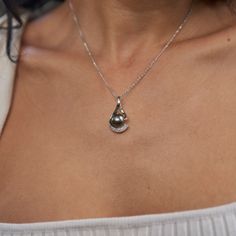 Pendant 14k White Gold 11-12mm Tahitian Black Pearl Natural Diamond: 0.18 CTW Measures approx. 35mm in length x 15.87mm in width (1.38" x 0.625") Chain not included, Shop Chains Now Exclusively Made in Hawaiʻi Forever Guarantee (Warranty on the life of the piece) Free Shipping on USA Orders $100 or more Due to their nature, no two pearls are alike. Pearls will vary in color, shape and overtone. Dimples, birthmarks, surface imperfections may be present and speak to their nature making each pearl White Gold Teardrop Jewelry With Shiny Finish, Teardrop Shaped Jewelry With Shiny Finish For Anniversary, Drop Shaped Jewelry With Shiny Finish For Gifts, White Gold Drop Jewelry With Shiny Finish, Luxury Teardrop Jewelry With Shiny Finish, White Gold Tahitian Pearl Jewelry With Diamond Accents, Tahitian Pearl White Gold Jewelry With Diamond Accents, Tahitian Pearl Teardrop Jewelry For Formal Occasions, Elegant Tahitian Pearl Jewelry For Anniversary