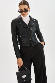 Exude confidence with the Monica Faux Leather Jacket, a true wardrobe essential for the modern woman. This classic piece features an asymmetric front zip closure, zipper pockets & notch collar. Versatile and effortlessly stylish, this jacket is perfect for both casual and formal occasions. Leather Jacket Elegant Outfit, Black Leather Jacket Women, Leather Jacket Women, Womens Black Leather Jacket, Exude Confidence, Black Faux Leather Jacket, Lady Biker, Notch Collar, Faux Leather Jacket