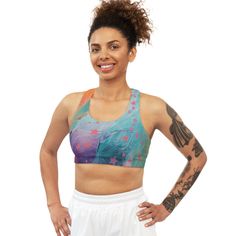 A seamless sports bra featuring paint brush strokes and stars design, perfect for workouts and sports activities. Made from stretchy microfiber and spandex mix fabric with moisture wicking properties, giving medium support and a comfortable feel. Ideal for gym-goers, athletes, and those leading an active lifestyle. Relevant for fitness enthusiasts, athletes, and gym lovers. Perfect for holidays, observances, and celebrations related to fitness and sports. Product features - Moisture wicking fabric for enhanced comfort - Hidden seams for added comfort - Medium support for gym and everyday activities - Elastic and stretchy fabric for better movement - Durable and stretchy material for long-lasting wear Care instructions - Do not dryclean - Iron, steam or dry: low heat - Drip dry - Do not ble Paint Brush Strokes, Bra Workout, Stars Design, Gym Clothing, Seamless Sports Bra, Fitness Apparel, Athletic Top, Workout Outfit, Star Pattern