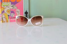 "RARE these are amazing! frame width=6\" arm width=5\" lens width=2.5\" Retro & Me loves these sunnies!! white sunnies one of a kind for sure New Old Stock sunglasses great vintage condition 1970s perfect for pool parties love super retro! Thank YOU and please feel free to ask me any ?s:) Have a lovely day!! xoxo www.etsy.com/shop/retroandme #coolness" Vintage Cat Eye Sunglasses For Spring Party, Retro Sunglasses For Spring Party, Retro Cat Eye Sunglasses For Summer Party, Vintage White Party Sunglasses, Vintage Cat Eye Sunglasses For Spring, White Sunnies, Sunglasses Big, Girl Sunglasses, Party Glasses