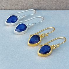 DaniMini Blue Sapphire Gold Earrings 18 CT Gold Vermeil on Sterling Silver GEMSTONE BLUE SAPPHIRE  A simply beautiful everyday earrings with a unique gemstone. Perfect to combine with other jewels from the same collection. Tiny and Dainty hook earrings Soft Brushed Textured Gemstone Length 9mm x 6mm Total length of the earrings including hooks is 3cm. ★GEMSTONE CORUNDUM BLUE SAPPHIRE September birthstone Sapphire have properties of protection, bringing spiritual insight, and good fortune. Note t Teardrop Sapphire Faceted Jewelry, Faceted Teardrop Sapphire Jewelry, Teardrop Sapphire Jewelry With Matching Earrings, Teardrop Sapphire Earrings For Gift, Faceted Teardrop Earrings For Jewelry Making, Sapphire Teardrop Gemstone Earrings, Sapphire Teardrop Birthstone Earrings, Sapphire Teardrop Earrings With Ear Wire, Jewellery Women