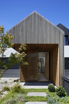 an image of a house that is made out of wood