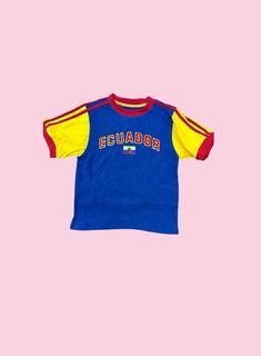 ✨90's/2000's vibes ❤️   ✨Ecuador crop top ✨y2k football/soccer tee ✨Cute bright coloured crop top ✨Perfect for summer ✨South America aesthetic 🇪🇨    ✨See sizing guide for measurements  ✨Feel free to message me with any questions 😊 Y2k Style Multicolor Short Sleeve T-shirt, 90s Sports T-shirt For Summer, 90s Style Short Sleeve Sports T-shirt, Y2k Multicolor Tops For Streetwear, Y2k Short Sleeve Tops For Sports, Y2k Fan Merchandise Tops With Logo Print, Retro Multicolor Sports Tops, Multicolor Retro Sports Tops, Sporty Multicolor Short Sleeve T-shirt