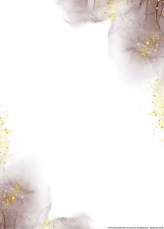 an abstract white background with gold flecks and glitter on the bottom right corner