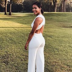 Lulus Exclusive! Your admirers will have a lot to say about their love for you in the Lulus Thinking Out Loud White Backless Jumpsuit! Medium-weight knit is formed to a sleeveless bodice, with V-neck, darting, and wide straps that cross over the open back. Bit of elastic at the waist tops the wide-leg pants. Fit: This garment fits true to size. Length: Floor length. Size small measures 60" from shoulder to hem. Inseam: 31.50 Front Rise: 12.00 Bust: Great for any cup size. Waist: Fitted - stretch Chic Fitted Bodysuit With Back Opening, Chic White Backless Jumpsuit, Fitted Jumpsuits With Back Opening, Fitted Jumpsuits And Rompers With Back Opening, White Backless Jumpsuits And Rompers For Date Night, Fitted Summer Jumpsuit With Back Opening, Fitted Summer Jumpsuits And Rompers With Back Opening, White Fitted Sleeveless Jumpsuits And Rompers, Fitted Sleeveless White Jumpsuits And Rompers