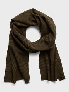 Soft and cozy, this wool scarf is designed to carry you through the seasons.  Length: 76" (193cm) Width: 13" (33cm)