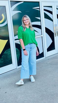 🌟Golden Kelly Blouse 🌟 Hey, fashionistas! Meet your new wardrobe MVP, the Golden Kelly Blouse! This vibrant green gem is perfect for those days when you want to add a pop of color and a whole lot of cheer to your outfit. 🌿 Crafted with the softest, most breathable fabric, this blouse promises to keep you comfy and cool, whether you're out on a sunny adventure or rocking your 9-to-5 grind. The relaxed fit and chic rolled sleeves make it a versatile piece that pairs perfectly with everything fr Green Relaxed Fit V-neck Blouse, Casual Green V-neck Blouse, Green V-neck Top For Day Out, Trendy Green V-neck Top, Versatile Green V-neck Top, Trendy Kelly Green Tops For Spring, Versatile Green Top For Spring, Green Relaxed Fit Versatile Blouse, Versatile Green Blouse With Relaxed Fit