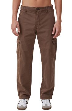 March to a utilitarian beat in these cargo pants cut from soft cotton and plenty of pockets for all your daily essentials. 32" inseam; 10 1/2" front rise Zip fly with button closure Front slant pockets; cargo flap-patch pockets; back flap-patch pockets 100% cotton Machine wash, line dry Imported Cotton Cargo Pants With Multiple Pockets For Outdoor Activities, Brown Cargo Pants With Multiple Pockets For Outdoor Activities, Cotton Cargo Pants With Side Pockets For Outdoor Activities, Brown Cotton Cargo Jeans With Pockets, Cotton Cargo Jeans With Multiple Pockets For Outdoor Activities, Brown Cargo Pants With Side Pockets For Outdoor, Utility Cotton Cargo Pants For Outdoor Activities, Cotton Cargo Jeans For Outdoor Activities, Cotton Cargo Pants For Fall Outdoor Activities