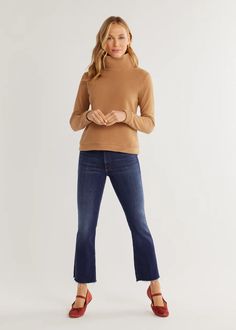 Our flagship style meets a shorter silhouette in this essentially wearable signature turtleneck. Paired with virtually anything, alone or as a layer, it’s a hard-working, easy-wearing style staple. Model is 5'9.5" and wearing a size small Measurements from a size small Back Length: 23" Sleeve Length: 24" Bust: 36" Vello Fleece Washing Care Machine wash warm, inside out, with like colors Hang to dry Do not bleach or iron Avoid use of fabric softener; avoid washing with towels View Fabric Guide Dudley Stephens, Coffee Table Books Decor, Coffee Table Candles, Camel Shorts, Natural Blush, Park Slope, Headband Jewelry, Wearing Style, Recycled Yarn