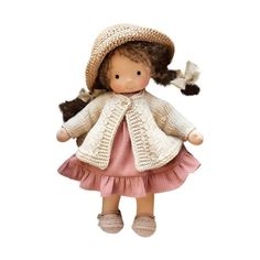 a doll wearing a dress and hat