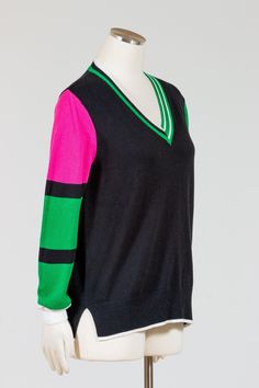 Zaket & Plover's Cricket Sweater is a long sleeve V-neck sweater with colorful striped sleeves and stripes details. This vibrant design is lightweight, made primarily in cotton. Fit is relaxed and comfortable. Banded ribbed hem and cuffs. Falls a bit over the hips with split sides. No pockets. Made in ChinaFabric: 95% Cotton, 5% CashmereCare: Hand Wash Cold, Dry Flat Zaket & Plover Size Chart >Measurements: Approximate, taken flat and unstretchedMedium (M): Bust 42", Hips 40", Length 24.5" Striped Sleeve, Vneck Sweater, Black Sweaters, Fabric Care, Cashmere, Knitwear, Stripes, V Neck, Long Sleeve