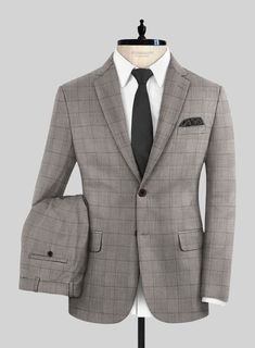 Revitalize your fashion game with a dose of daring style embodied in the unique signature of our Loro Piana Chiara Wool Suit. Meticulously crafted from pure wool fabric, this suit exemplifies an exquisite interplay of rich brown and cream hues in a sophisticated plaid pattern, creating a visual texture that is both refined and distinctive, ensuring not only a luxurious feel but also comfort. Whether worn in a professional setting, gracing a social event, or enhancing a special evening out, the s Designer Fitted Suits For Office, Tailored Designer Business Sets, Designer Tailored Business Sets, Designer Notch Lapel Sets For Work, Designer Tailored Sets For Business, Luxury Fitted Single Breasted Three-piece Suit, Designer Sets With Notch Lapel For Work, Luxury Fitted Single-breasted Three-piece Suit, Luxury Fitted Sets For Workwear