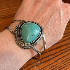 Faux Turquoise Cuff Bracelet Has Silver Plated Finish And Some 'Carving' Around Bezel. Recommend Wrist Size Of 6" - 7" On This One. Adjustable Turquoise Metal Cuff Bracelet, Turquoise Metal Bangle Cuff Bracelet, Adjustable Turquoise Cuff Bangle, Turquoise Metal Cuff Bracelet As Gift, Turquoise Metal Cuff Bracelet Gift, Bohemian Turquoise Metal Cuff Bracelet, Turquoise Bracelet Cuff, Turquoise Cuff, Bracelet Bangle