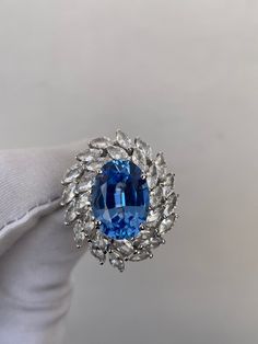 Luxury Sapphire Ring, Oval Cut Ring, Sapphire Cluster Ring, 14k Solid Gold,  Engagement Ring, Wedding Ring, Bridesmaid Ring, Halo Ring, Ceylon Ring Handmade ring. Stone : Lab Blue Sapphire Gemstone Cut : Oval Cut Stone Size : 10mm×14mm Side Stone : Cubic Zirconia Metal  : 14k Gold / 925 Silver Plating:  Platinum Plated , Rose Gold Plated , Gold Plated. Personalization:10K/14K/24K/GOLD/SILVER/PLATINUM/ROSE-GOLD/WHITE GOLD. (Contact me)  All items come in a beautiful jewelry box.  Since all out Jewelry is Handmade with care and love, It takes [6-8 Business Days] to make the item. Once the item is made: Standard Shipping: 1-3 Weeks Express Shipping: 4-12 Days.  If you need anything personalized then you are MOST WELCOME. We specialized in personalized jewelry of all kinds, We have All Gemston Luxury Sapphire Cluster Ring With Cubic Zirconia, Sapphire Cluster Ring, Bridesmaid Ring, Oval Sapphire Ring, Bridesmaid Rings, Oval Cut Ring, Platinum Rose Gold, Ring Sapphire, Ring Halo