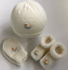 Hand-knitted in soft pure Australian merino wool (easy care), these baby items will make a timeless and practical newborn baby or shower gift. Choose from booties, hat or mittens, or a matching set, which fit average newborn size (head circumference up to 40cm and foot length up to 9cm).  Note that hat brim can be turned up to fit smaller babies and then down as baby grows (see photos). These sets are personally hand knitted by me, and available in soft cream merino wool (note that colour may vary very slightly with wool dye lots and the display on your device) and I also do the hand-embroidery with quality DMC threads. Easy care - wash on gentle cycle in lingerie bag. Also available in navy, denim blue and baby blue (see separate listings). Hand-crafted by me in my smoke-free and pet-free Baby Mittens, Shower Bebe, Lingerie Bag, Small Baby, Knit Or Crochet, Baby Booties, Baby Grows, Head Circumference, Gender Neutral Baby