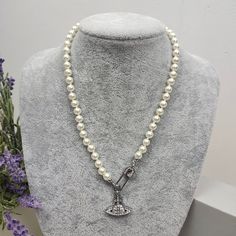 "Vivienne Westwood Silvery Safety Pin Pearl Necklace Brand New, Never Worn, Nwot Authentic Comes With Gift Box, Gift Bag, And Dust Bag,Brand Cards,Instruction Manual,Jewelt Cloth. Full Packing As Inculded. The Necklace Is Made Of Glass Pearls And Silver Plated. Length: 44cm(17.32'') Fast Shipping~ Thanks " Vivienne Westwood Pearl Necklace, Cherry Necklace, Pearl Drop Necklace, Square Necklace, Crystal Choker Necklace, Silver Pearl Necklace, Pearl Choker Necklace, Silver Choker, Crystal Choker