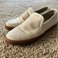 **Never Worn** Comfy And Casual Toms Slip On Sneakers! Great To Enhance Your Fall Look Beige Slip-on Sneakers For Everyday, Beige Low-top Casual Slip-ons, Casual Beige Low-top Slip-ons, Beige Slip-ons With Textured Sole For Everyday, Beige Textured Sole Slip-ons For Everyday, Everyday Canvas Slip-ons With Round Toe, Everyday Beige Slip-ons With Textured Sole, Casual Slip-ons With Gum Sole And Round Toe, Beige Canvas Low-top Slip-ons