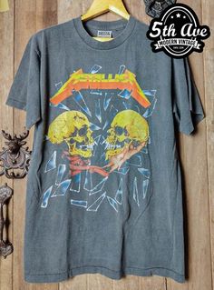 #metallica #americanheavymetalband #heavymetal #hardrock #speedmetal #thrashmetal #rock #rockband #rockt #rocktee #band #bandt #bandtee #bandtshirt #rockbandtshirt #rockbandtee #tshirt #tee #streetwear #vintagereprint #y2k #shopvintage #thrift #thriftshop #90sstyle #vintageclothing #vintaget #bootleg Acid Wash Band Merch T-shirt With Graphic Print, Unisex Acid Wash T-shirt With Screen Print, Band Merch T-shirt With Vintage Print For Streetwear, Vintage Graphic Crew Neck T-shirt, Vintage Crew Neck T-shirt With Graphic Design, Retro Distressed Crew Neck T-shirt, Distressed Band Merch T-shirt With Crew Neck, Summer Distressed T-shirt For Fan Merchandise, Retro Acid Wash Cotton T-shirt