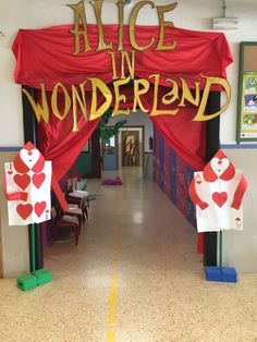 the entrance to alice in wonderland is decorated with paper hearts