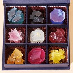 a box filled with lots of different types of candies