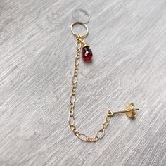 ♥Simply♥Dainty♥Everyday♥Minimal♥ 14k gold filled 14k rose gold filled 925 sterling silver  Natural and genuine Garnet Chain length: about 65mm If you need longer or shorter chain, please let me now. Earring hoop Inner diameter:  6mm 8mm 10mm Earring hoop gauge:  24 gauge/0.5mm 22 gauge/0.6mm 20 gauge/0.8mm Lobe earring post: 20 gauge ---------------------------------------------------------- 14k gold filled Anyone who can wear gold can wear gold filled without worries of any allergic reaction to 14k Gold Filled Dangle Jewelry With Delicate Chain, 14k Yellow Gold Filled Dangle Cartilage Earrings, Minimalist 14k Gold Dangle Cartilage Earrings, Rose Gold 14k Dangle Jewelry, Dainty Gold Plated Dangle Cartilage Earrings, Dainty Cartilage Earrings With Birthstone For Gifts, Single Teardrop Earring As Gift For Her, Single Teardrop Earring Gift For Her, Gold Plated Single Earring As Gift For Her