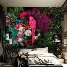 a bedroom decorated with tropical wallpaper and pink parrots