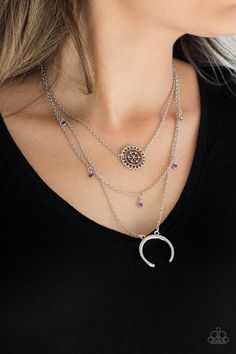 A silver floral frame swings from the uppermost chain, above a strand of faceted purple beads swinging from a shimmery silver chain. A silver crescent frame swings from the lowermost chain, creating whimsical layers down the chest. Features an adjustable clasp closure. Paparazzi Jewelry Images, Paparazzi Accessories Jewelry, Lotus Necklace, Hanging Necklaces, Purple Beads, Brown Necklace, Purple Necklace, Floral Frame, Purple Rhinestone